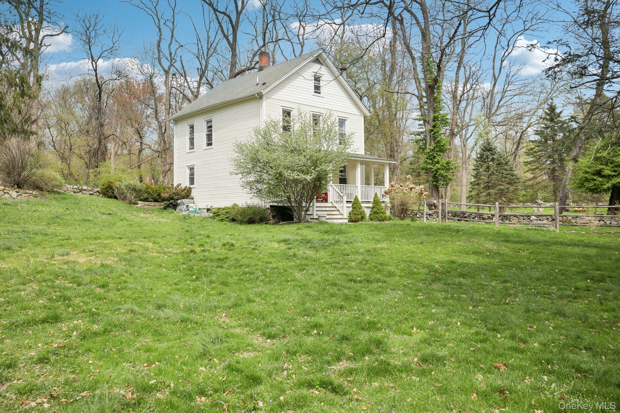 101 Spring Valley Road Ossining, NY 10562 - Photo 5 of 39 a front view of house with yard and green space