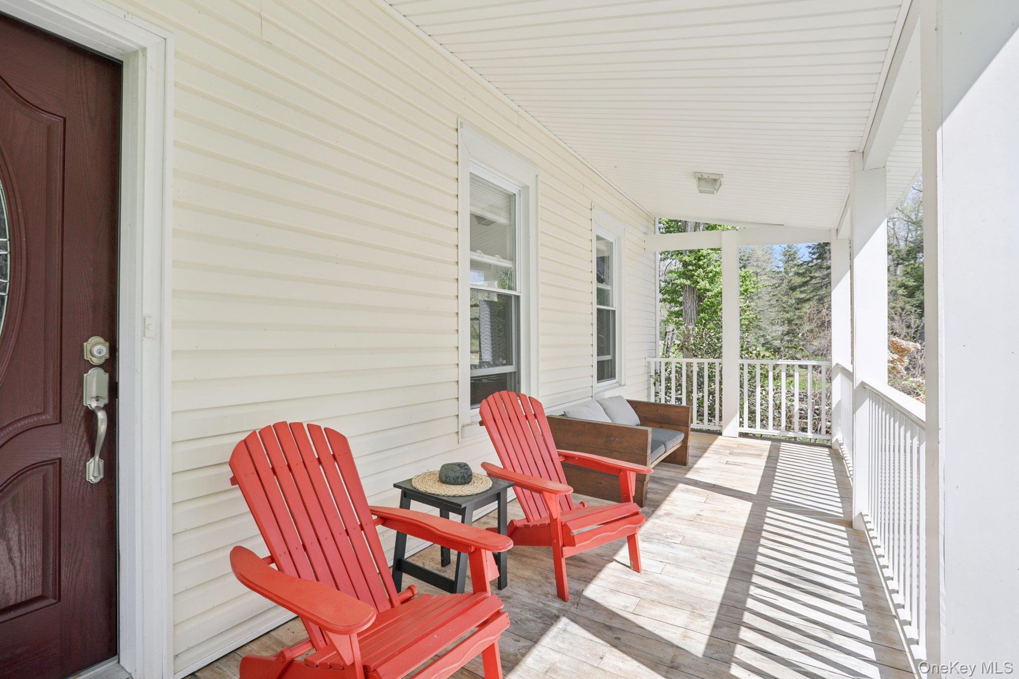 101 Spring Valley Road Ossining, NY 10562 - Photo 8 of 39 a balcony with wooden floor and outdoor seating