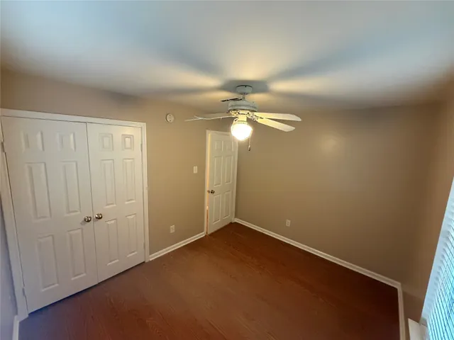 an empty room with a bathroom