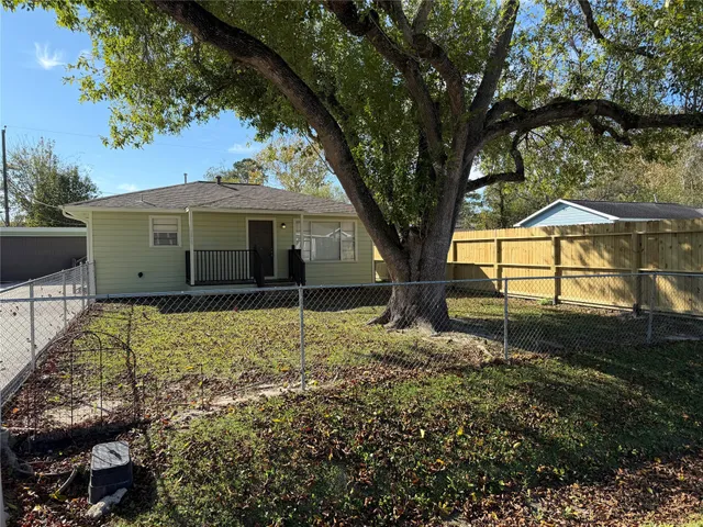 a house view with a garden space
