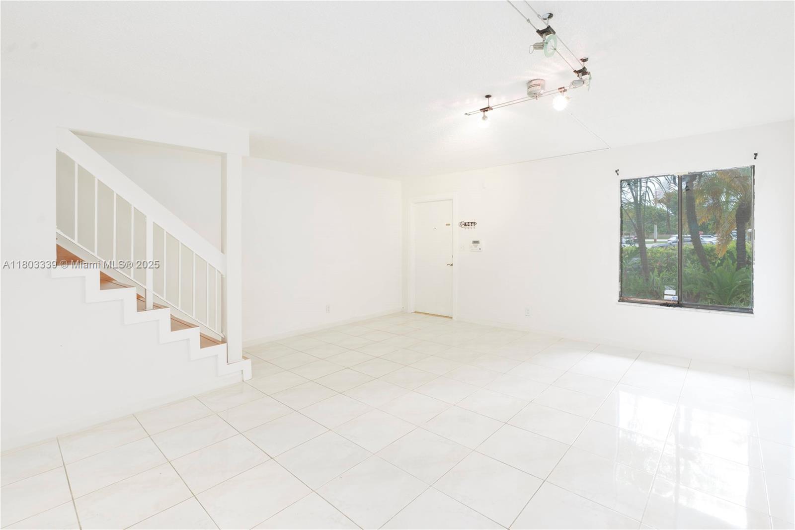 611 North University Drive, Unit 3 Plantation, FL 33324 - Photo 16 of 23 a view of an entryway with staircase