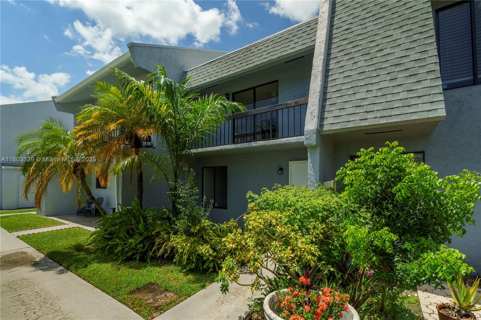 611 North University Drive, Unit 3 Plantation, FL 33324 - Photo 18 of 23 a front view of a house with a yard