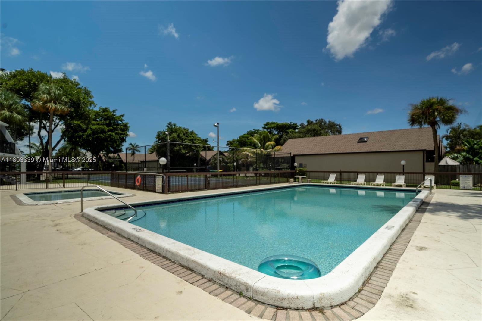 611 North University Drive, Unit 3 Plantation, FL 33324 - Photo 19 of 23 a view of a swimming pool with a yard