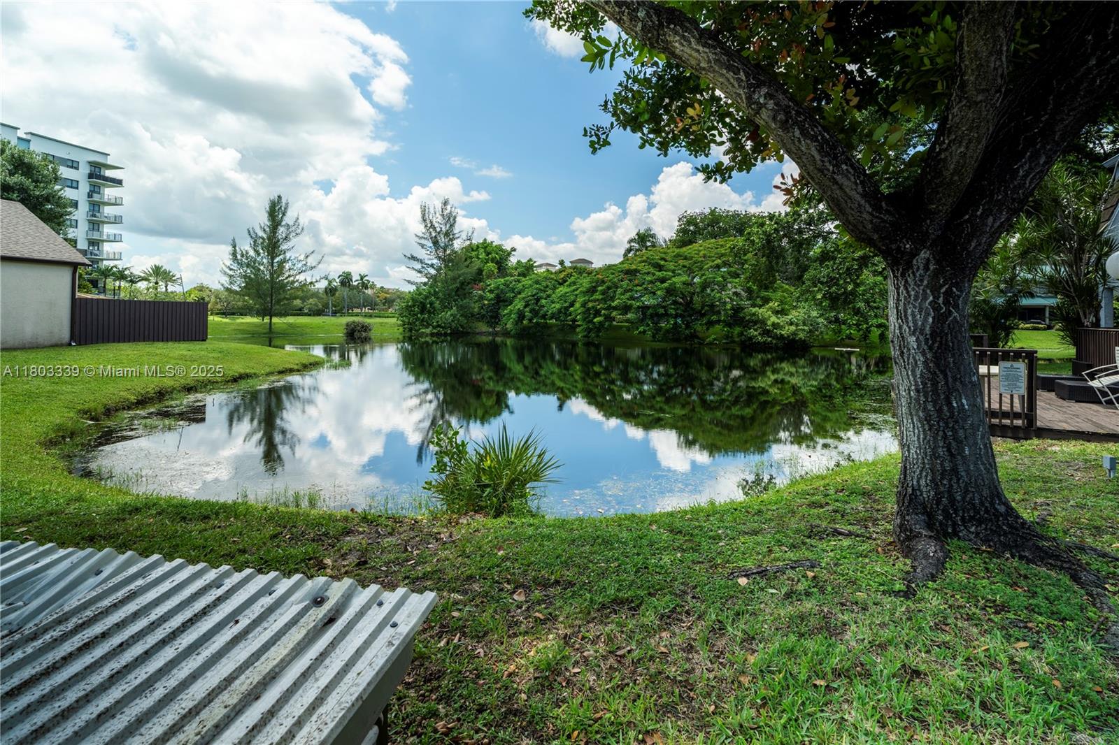 611 North University Drive, Unit 3 Plantation, FL 33324 - Photo 20 of 23 a view of a lake with a yard