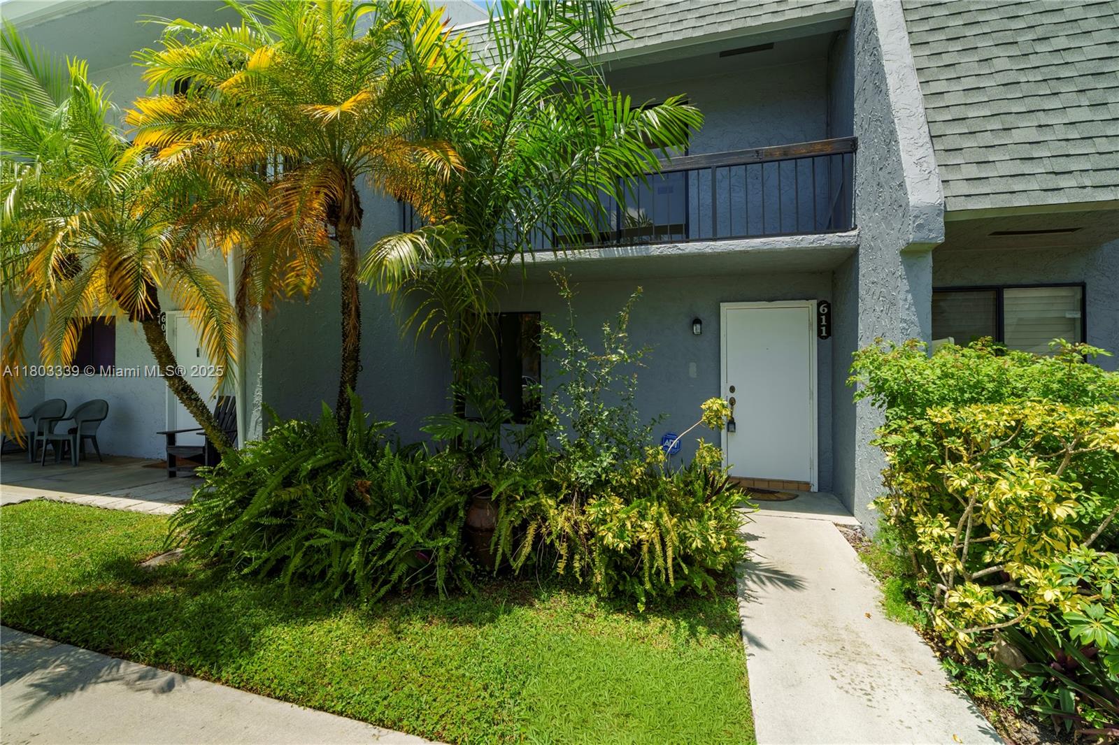 611 North University Drive, Unit 3 Plantation, FL 33324 - Photo 2 of 23 a front view of a house with a yard