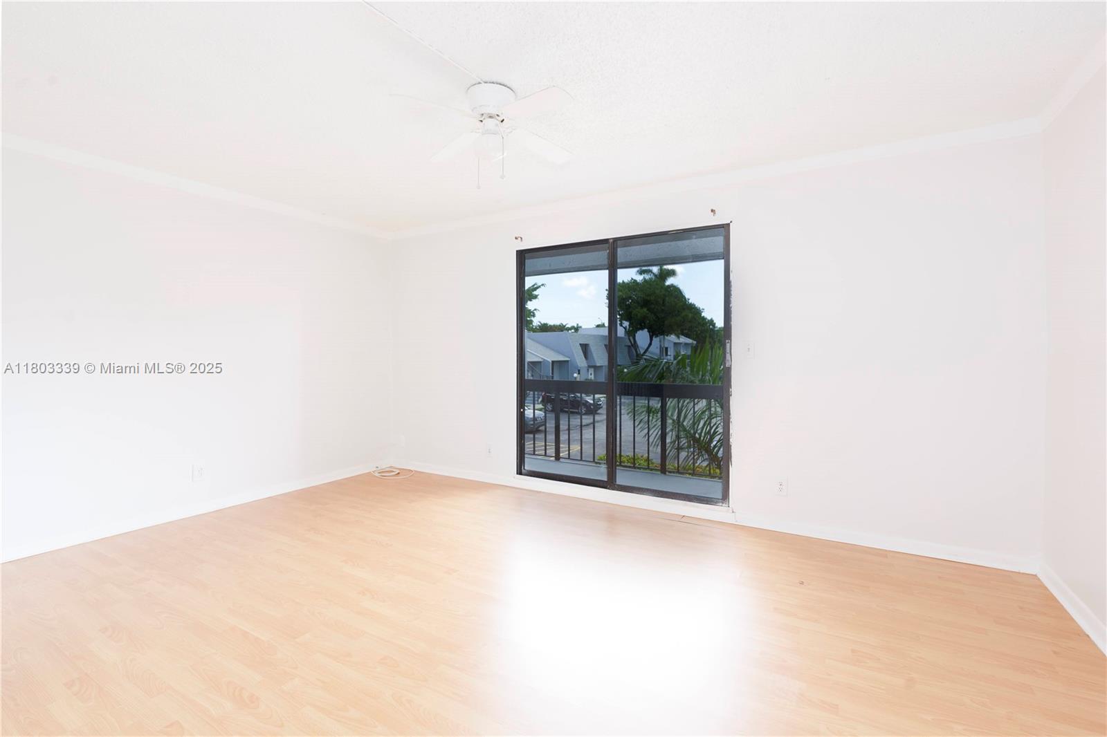 611 North University Drive, Unit 3 Plantation, FL 33324 - Photo 7 of 23 a view of an empty room with a window