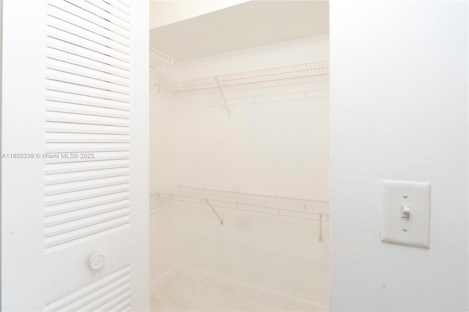 611 North University Drive, Unit 3 Plantation, FL 33324 - Photo 9 of 23 a close view of a closet