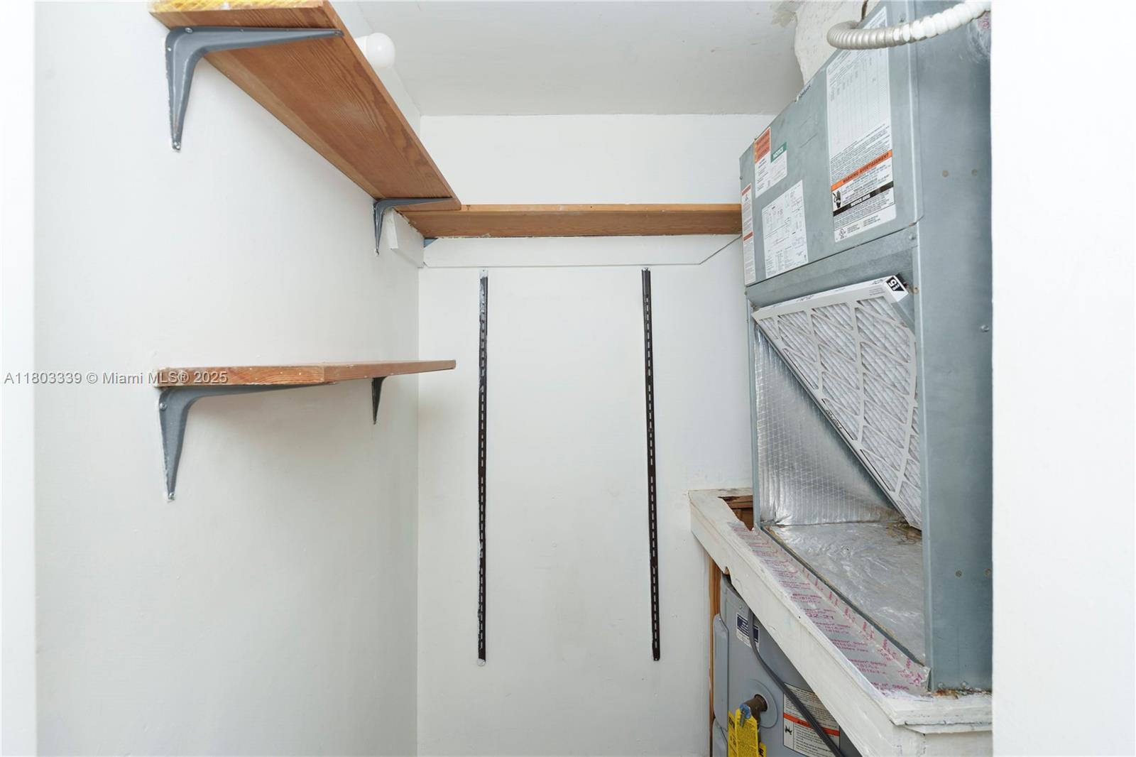 611 North University Drive, Unit 3 Plantation, FL 33324 - Photo 10 of 23 a view of walk in closet with clothes