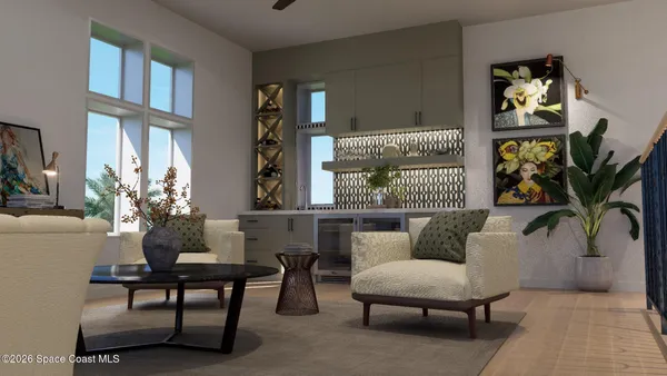 a living room with furniture and a potted plant