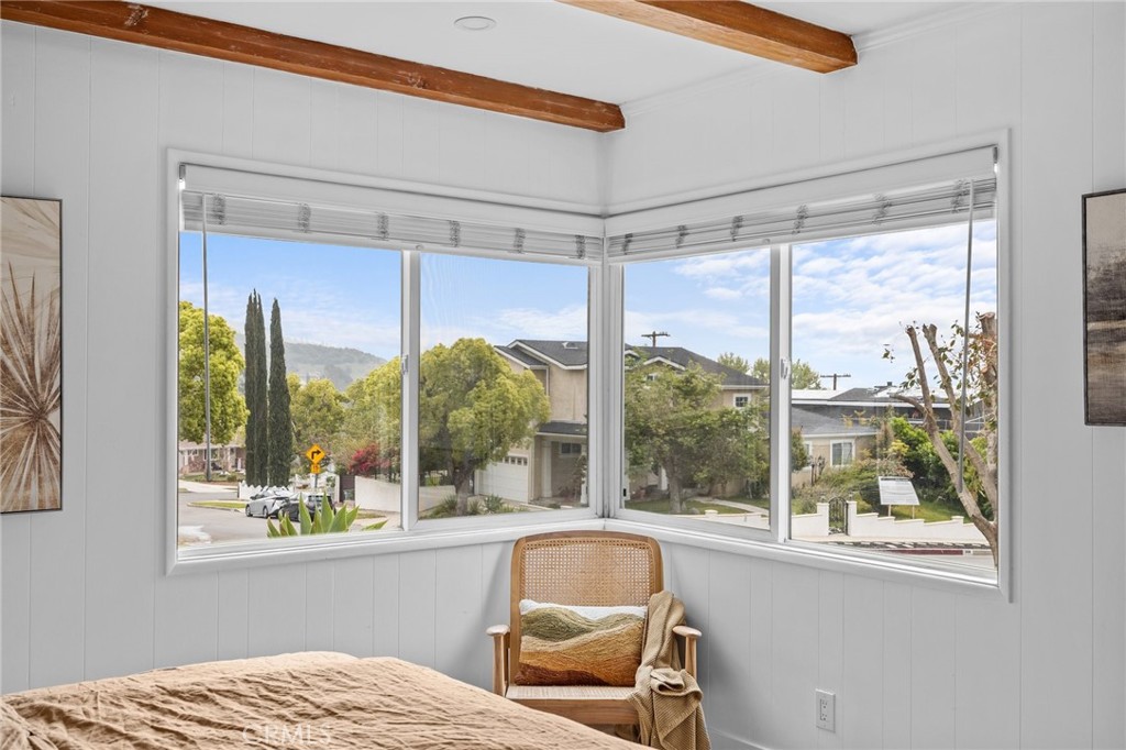 3045 Scott Road Burbank, CA 91504 - Photo 16 of 39 a bedroom with a large window and a bed