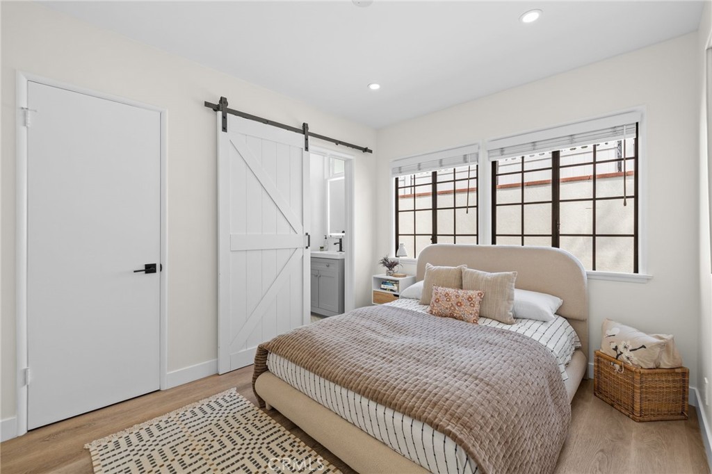 3045 Scott Road Burbank, CA 91504 - Photo 24 of 39 a bedroom with a large bed and a window