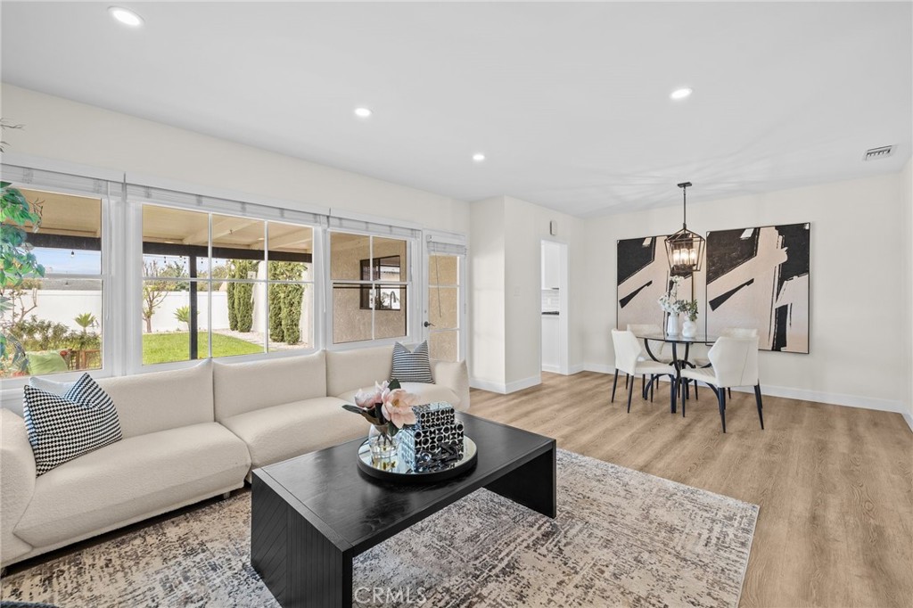 3045 Scott Road Burbank, CA 91504 - Photo 8 of 39 a living room with furniture and wooden floor