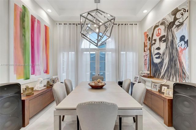 a open kitchen with stainless steel appliances granite countertop a stove oven and a refrigerator