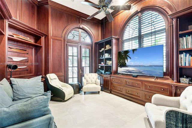 a view of a hallway with windows