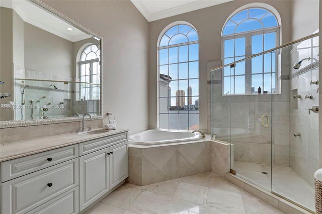 a view of a chair and tables in the patio