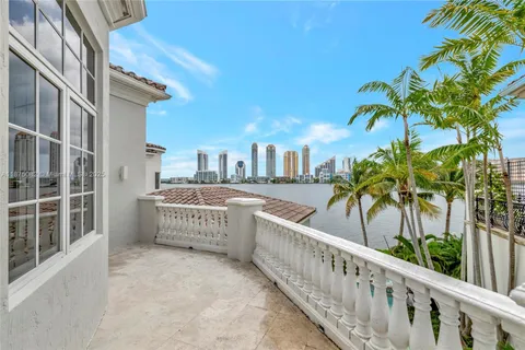 a bathroom with a granite countertop sink a mirror and a shower