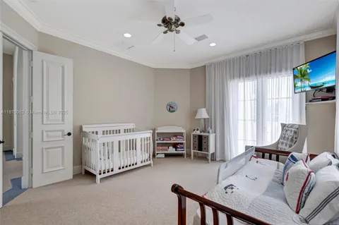 a room with a bed and a view of bedroom