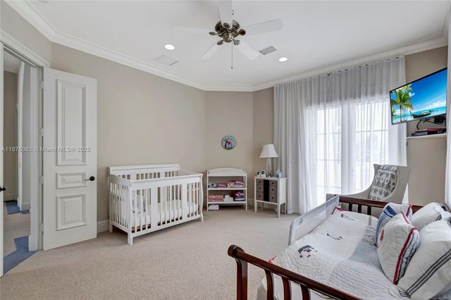 a room with a bed and a view of bedroom