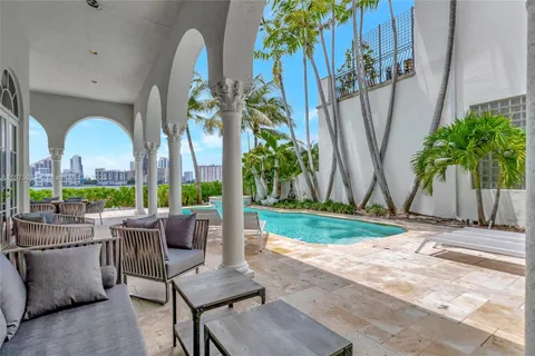 a view of a house with a yard and plant