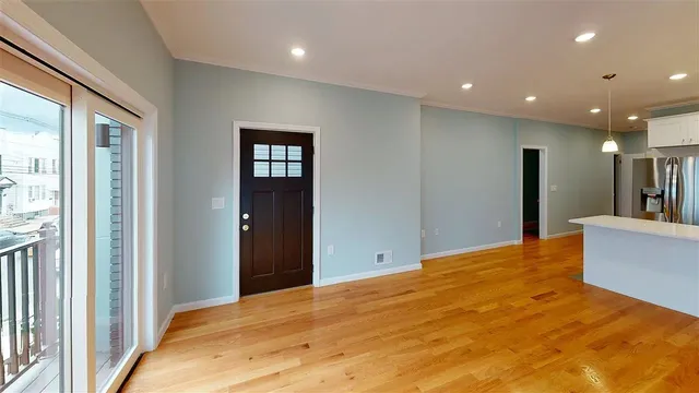 a view of an empty room and window