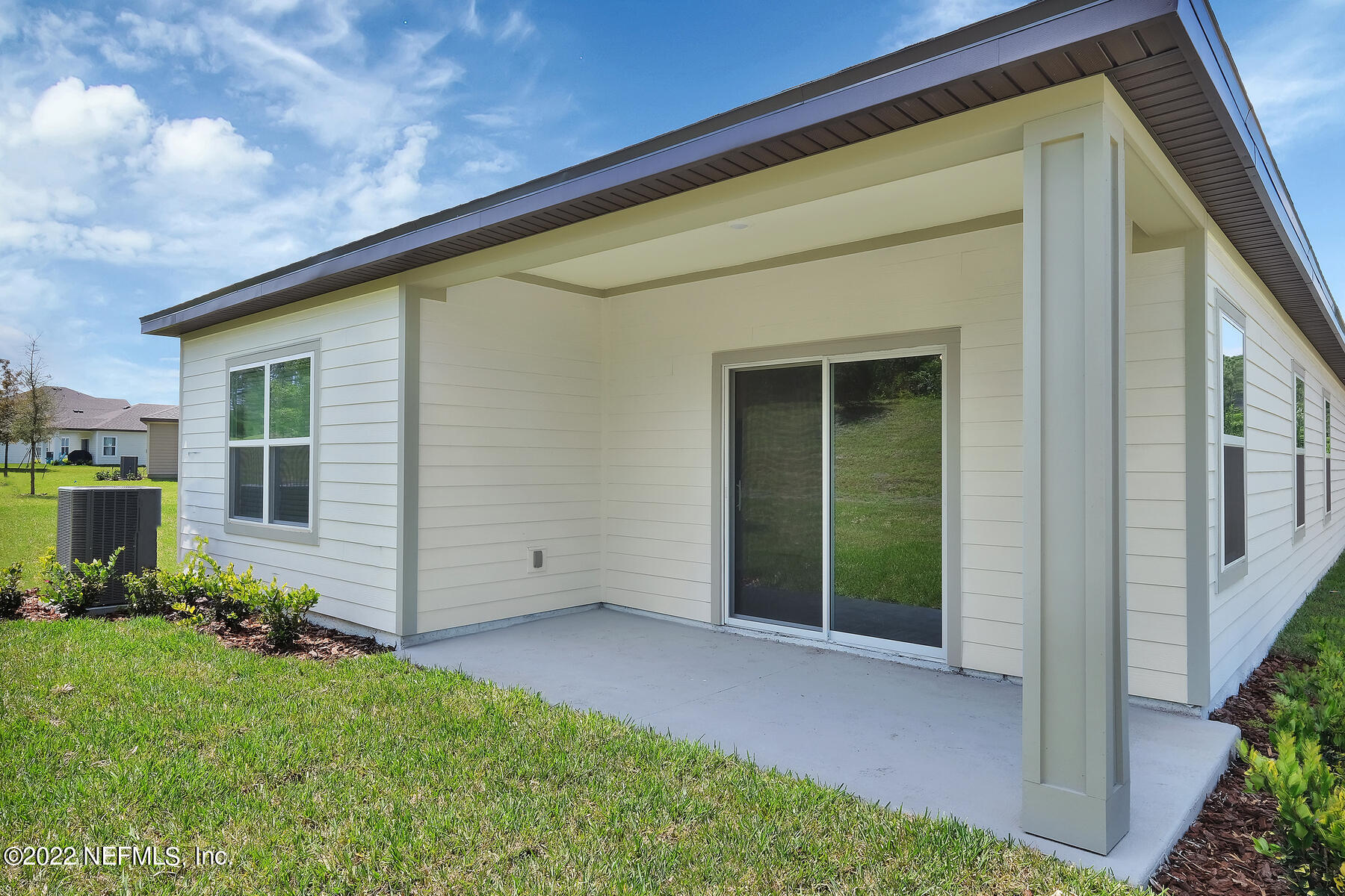 64 Falcon Ridge Road St. Augustine, FL 32084 - Photo 11 of 11 a view of an house with backyard and garden
