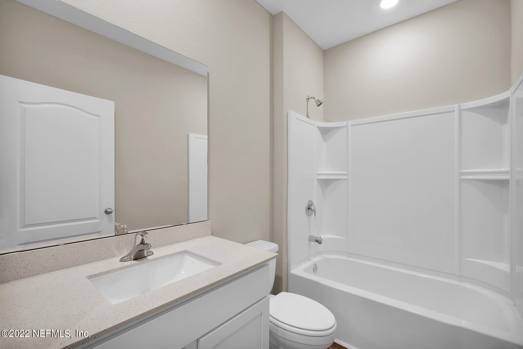 64 Falcon Ridge Road St. Augustine, FL 32084 - Photo 8 of 11 a bathroom with a sink toilet and shower