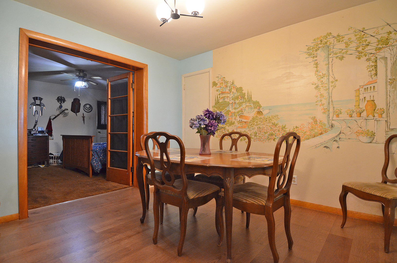 772 Adams Street Ottawa, IL 61350 - Photo 4 of 15 a view of a dining room with furniture and wooden floor