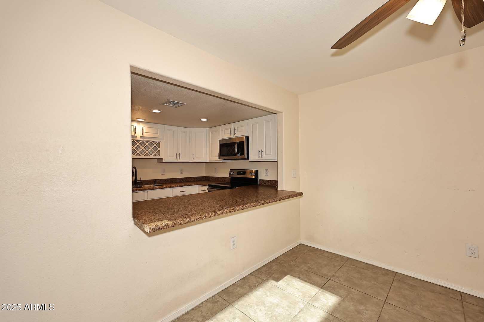 1645 West Baseline Road, Unit 2102 Mesa, AZ 85202 - Photo 13 of 34 Kitchen-Bar