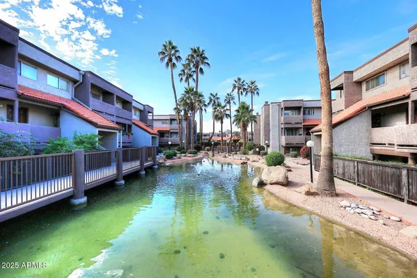 a view of a backyard with a patio