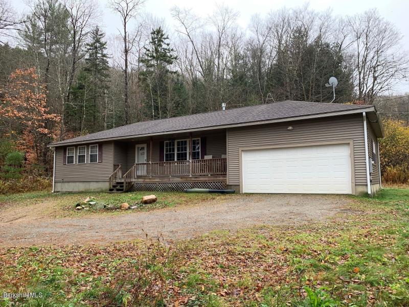 399 River Road Windsor, MA 01270 - Photo 1 of 19 a view of a house with a yard