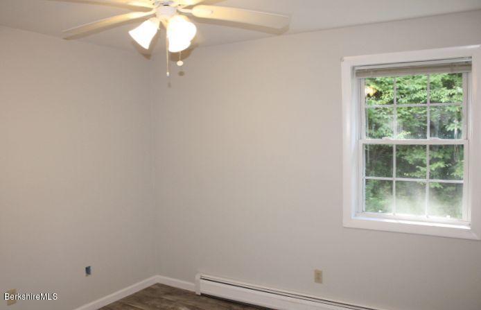 399 River Road Windsor, MA 01270 - Photo 12 of 19 an empty room with a window