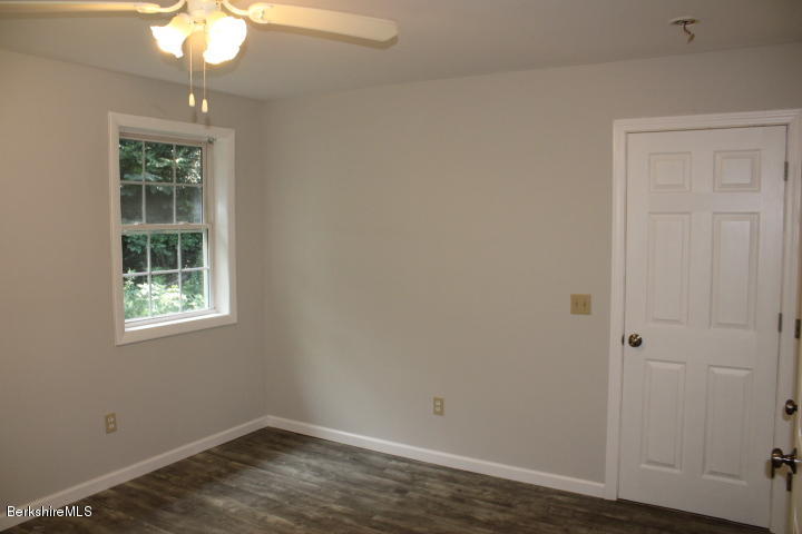 399 River Road Windsor, MA 01270 - Photo 15 of 19 an empty room with a window