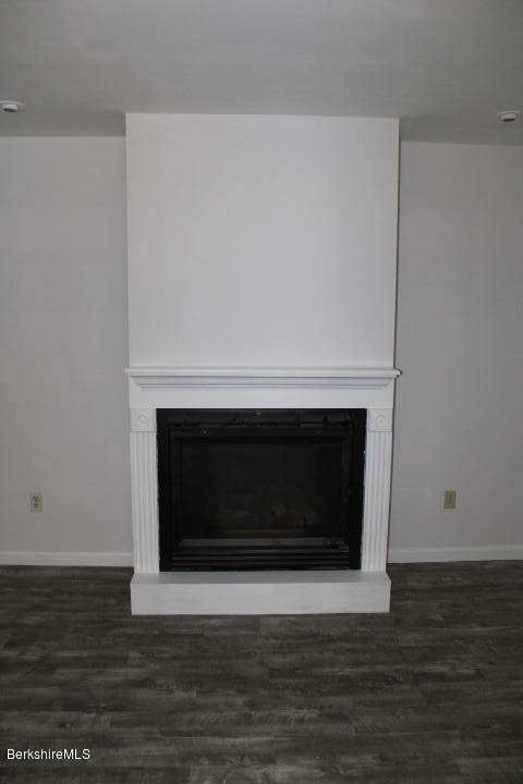 399 River Road Windsor, MA 01270 - Photo 6 of 19 a living room with a fireplace