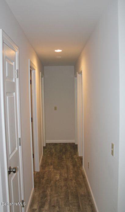 399 River Road Windsor, MA 01270 - Photo 9 of 19 a view of a hallway with wooden floor