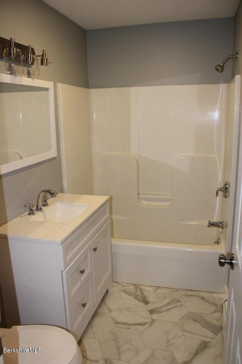 399 River Road Windsor, MA 01270 - Photo 10 of 19 a bathroom with a sink toilet vanity and tub