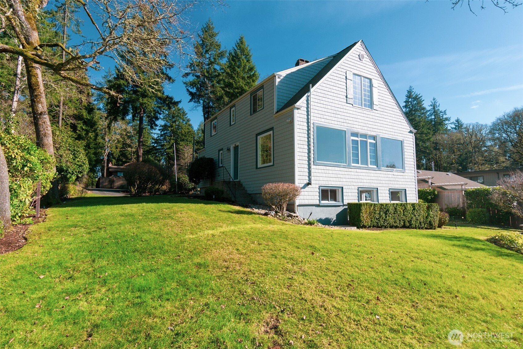 10826 Meadow Road Southwest Lakewood, WA 98499 - Photo 3 of 40 a view of a house with a yard