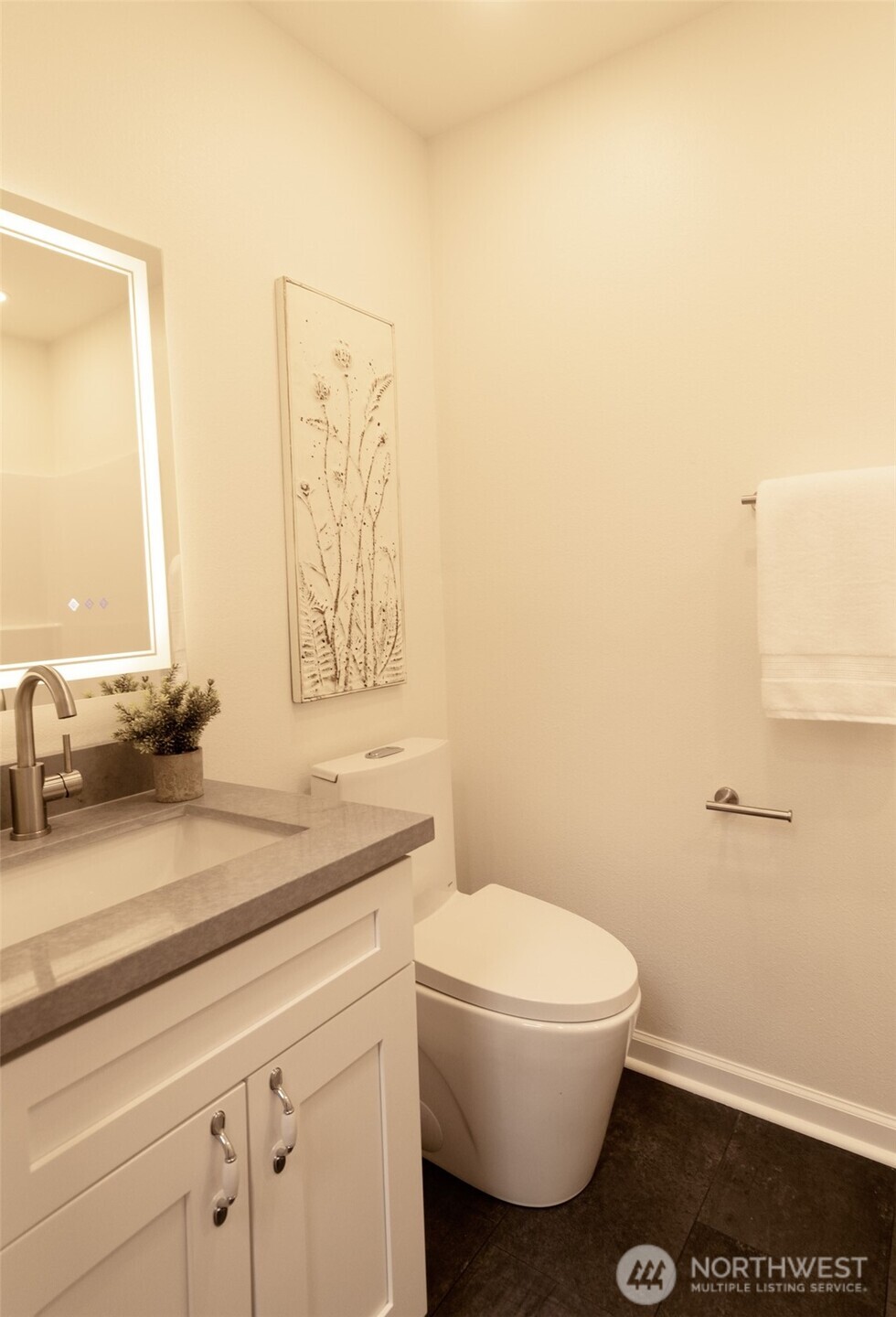 10826 Meadow Road Southwest Lakewood, WA 98499 - Photo 33 of 40 a bathroom with a granite countertop sink mirror vanity and toilet