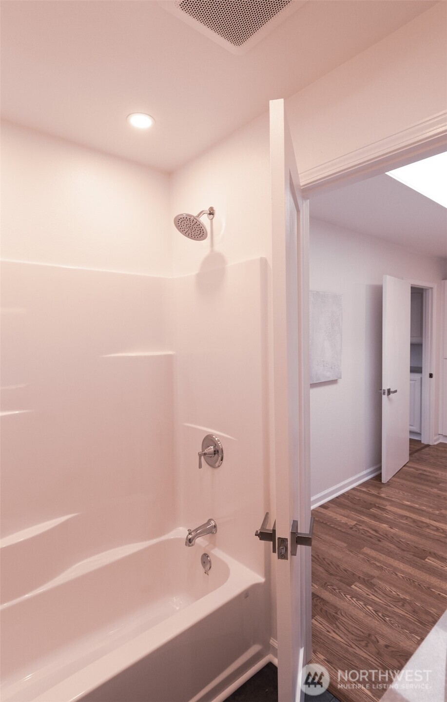 10826 Meadow Road Southwest Lakewood, WA 98499 - Photo 34 of 40 a bathroom with a bathtub and a sink