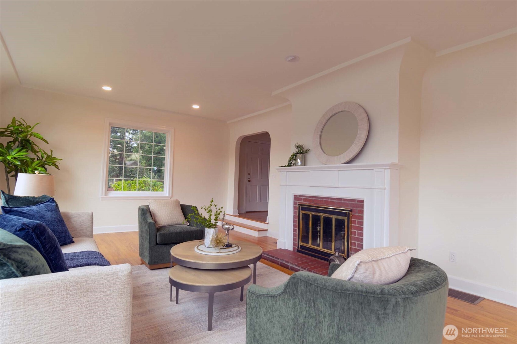 10826 Meadow Road Southwest Lakewood, WA 98499 - Photo 9 of 40 a living room with furniture and a fireplace