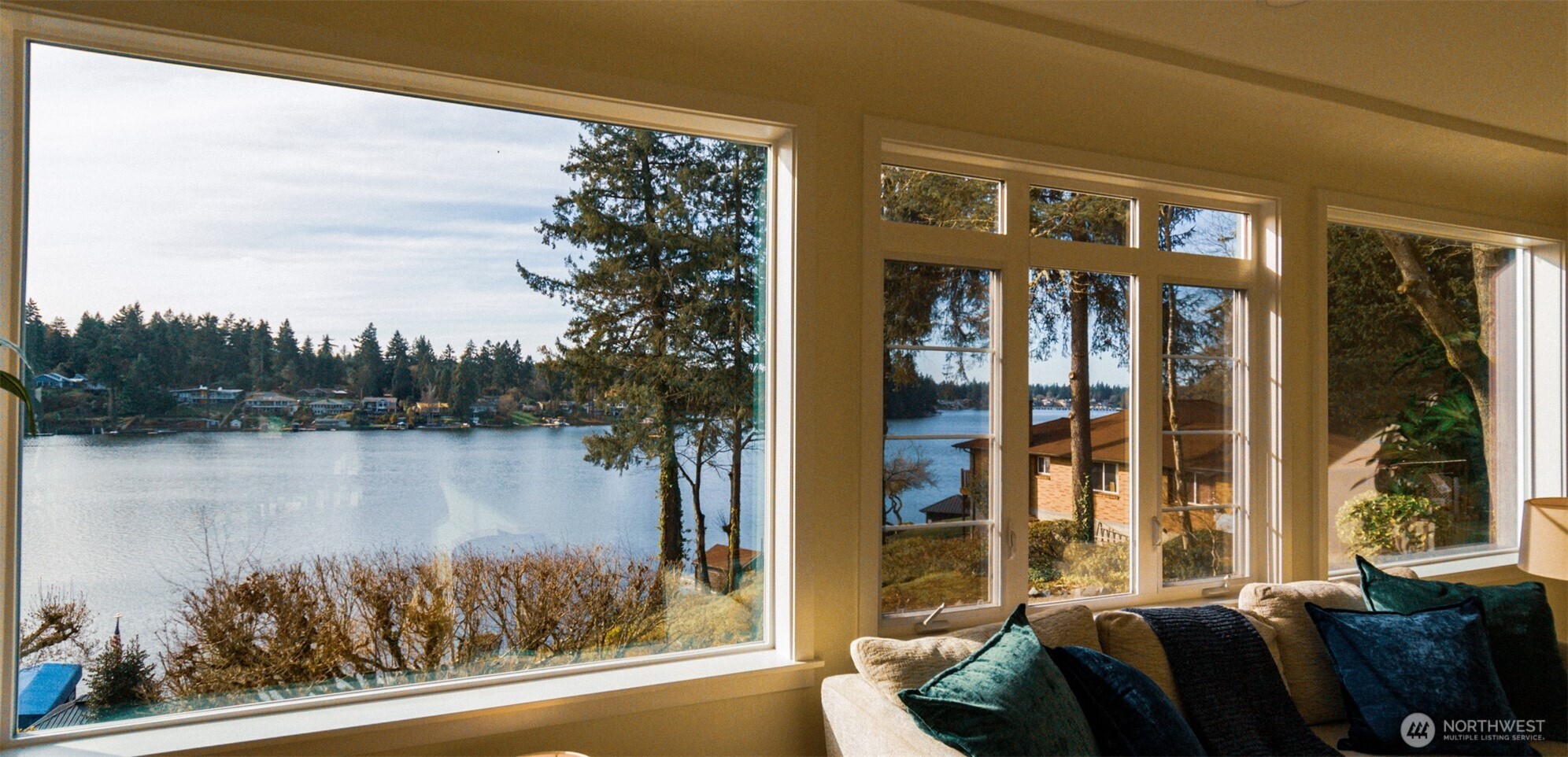 10826 Meadow Road Southwest Lakewood, WA 98499 - Photo 10 of 40 a view of a balcony with furniture and a floor to ceiling window