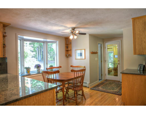 56 Border Road Concord, MA 01742 - Photo 3 of 11 a view of a dining room with furniture window and outside view