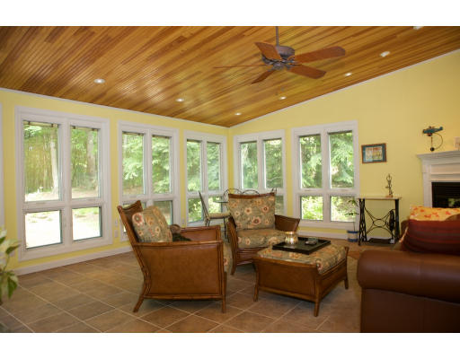 56 Border Road Concord, MA 01742 - Photo 7 of 11 a living room with furniture and a large window