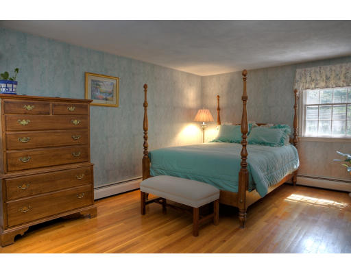 56 Border Road Concord, MA 01742 - Photo 9 of 11 a bedroom with a bed and a window