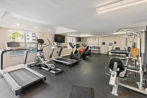 a view of a room with gym equipment