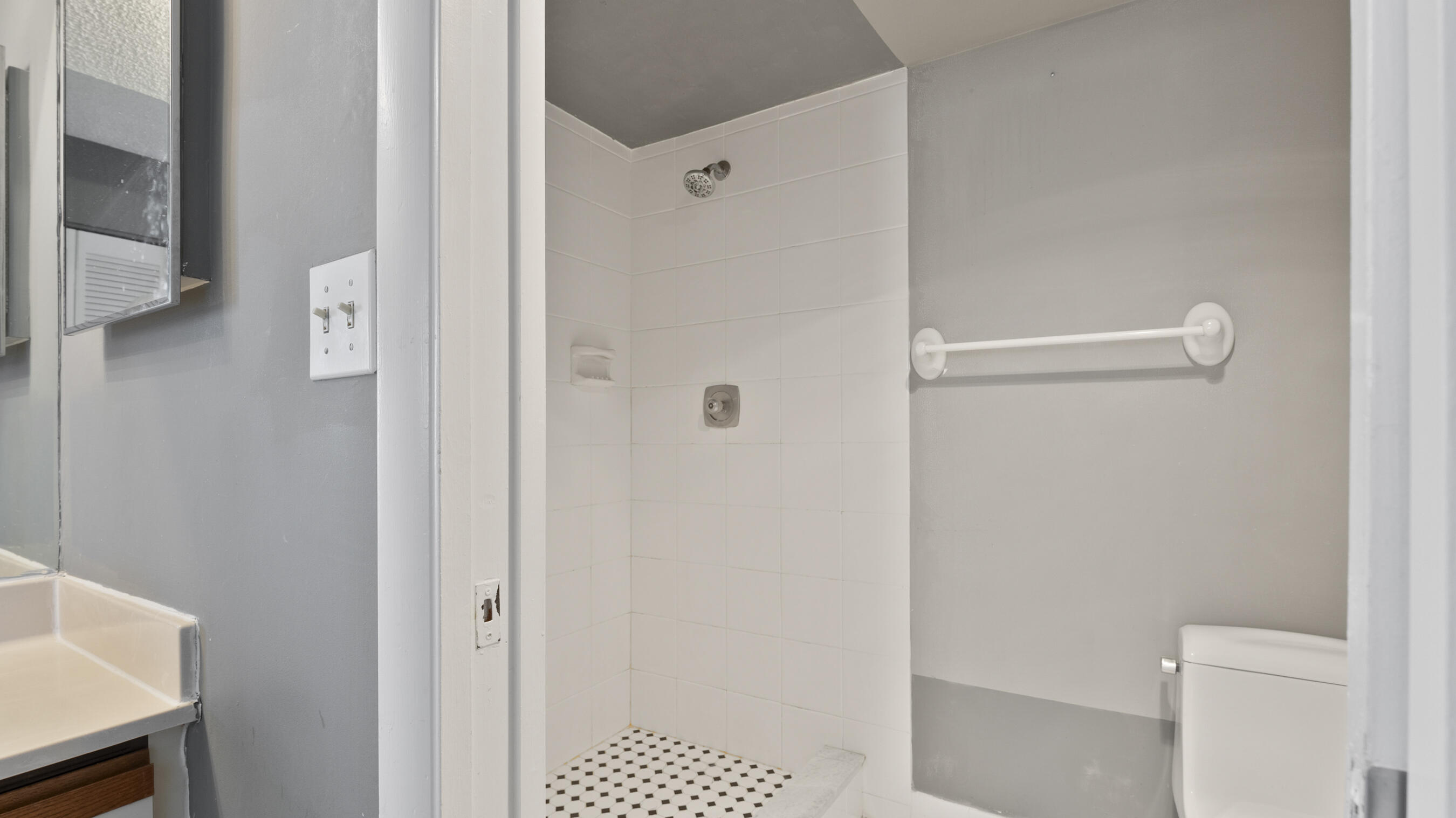 300 Ocean Trail Way, Unit 401 Jupiter, FL 33477 - Photo 12 of 41 a bathroom with a shower