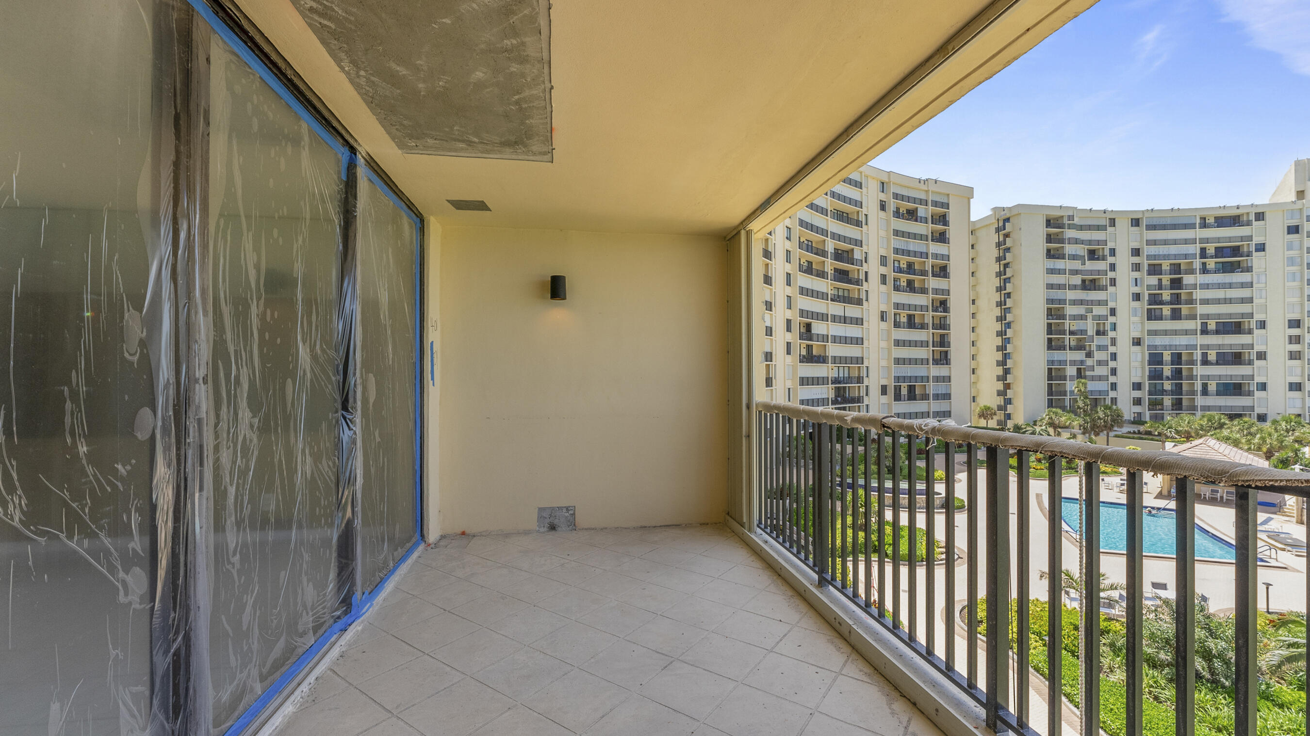 300 Ocean Trail Way, Unit 401 Jupiter, FL 33477 - Photo 19 of 41 a view of balcony with a small garden
