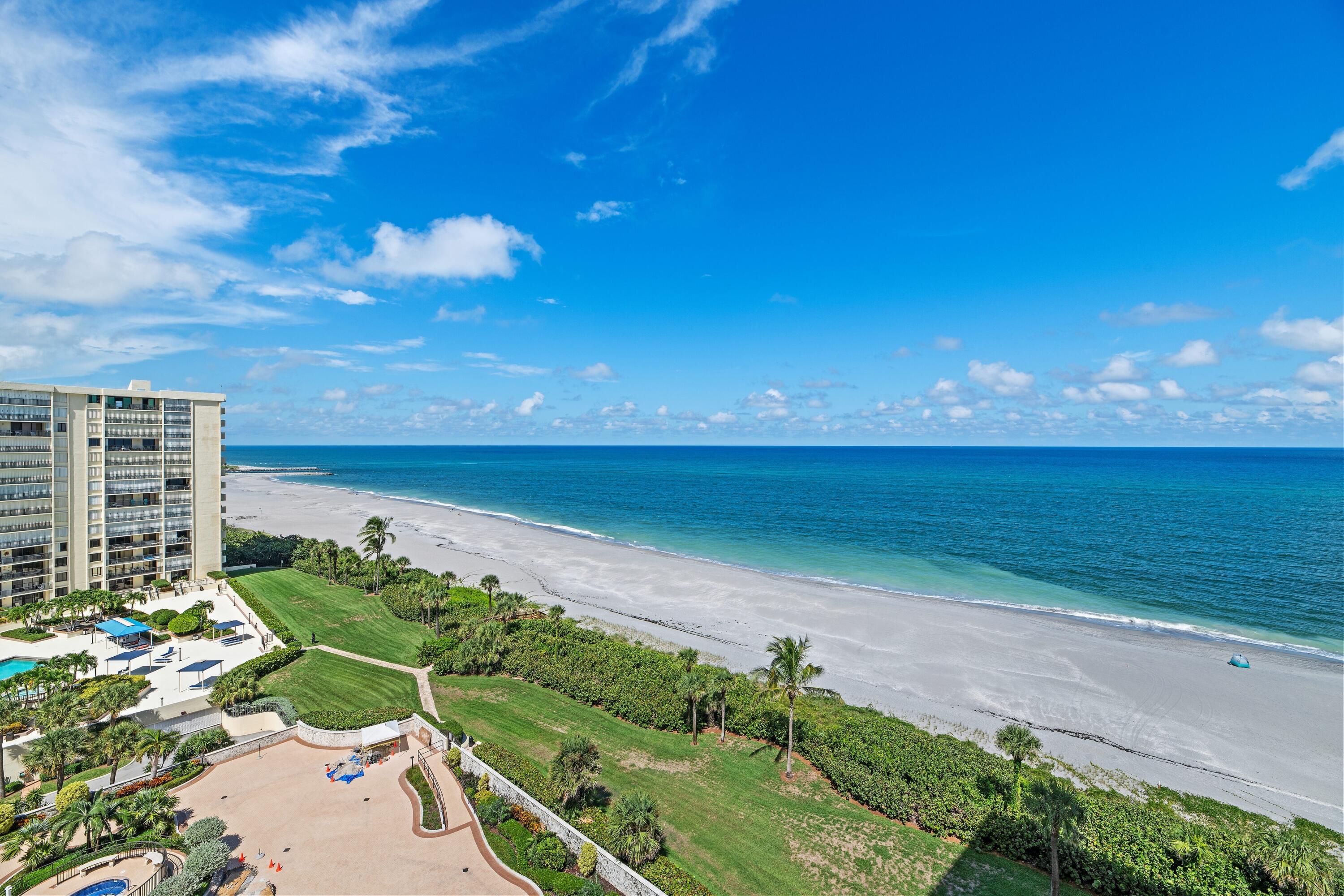 300 Ocean Trail Way, Unit 401 Jupiter, FL 33477 - Photo 26 of 41 a view of a yard with an ocean
