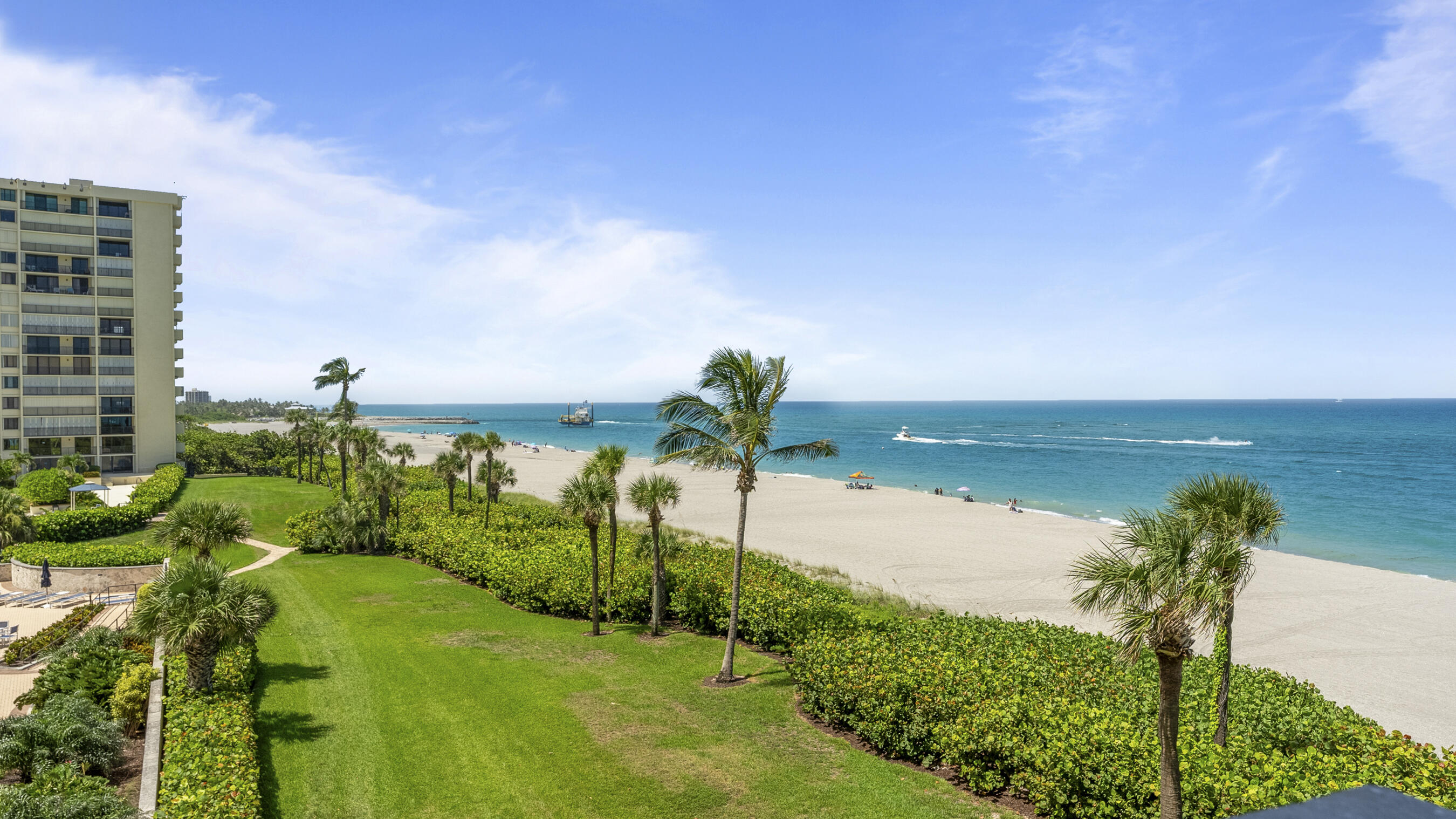 300 Ocean Trail Way, Unit 401 Jupiter, FL 33477 - Photo 27 of 41 a view of a lake with a yard