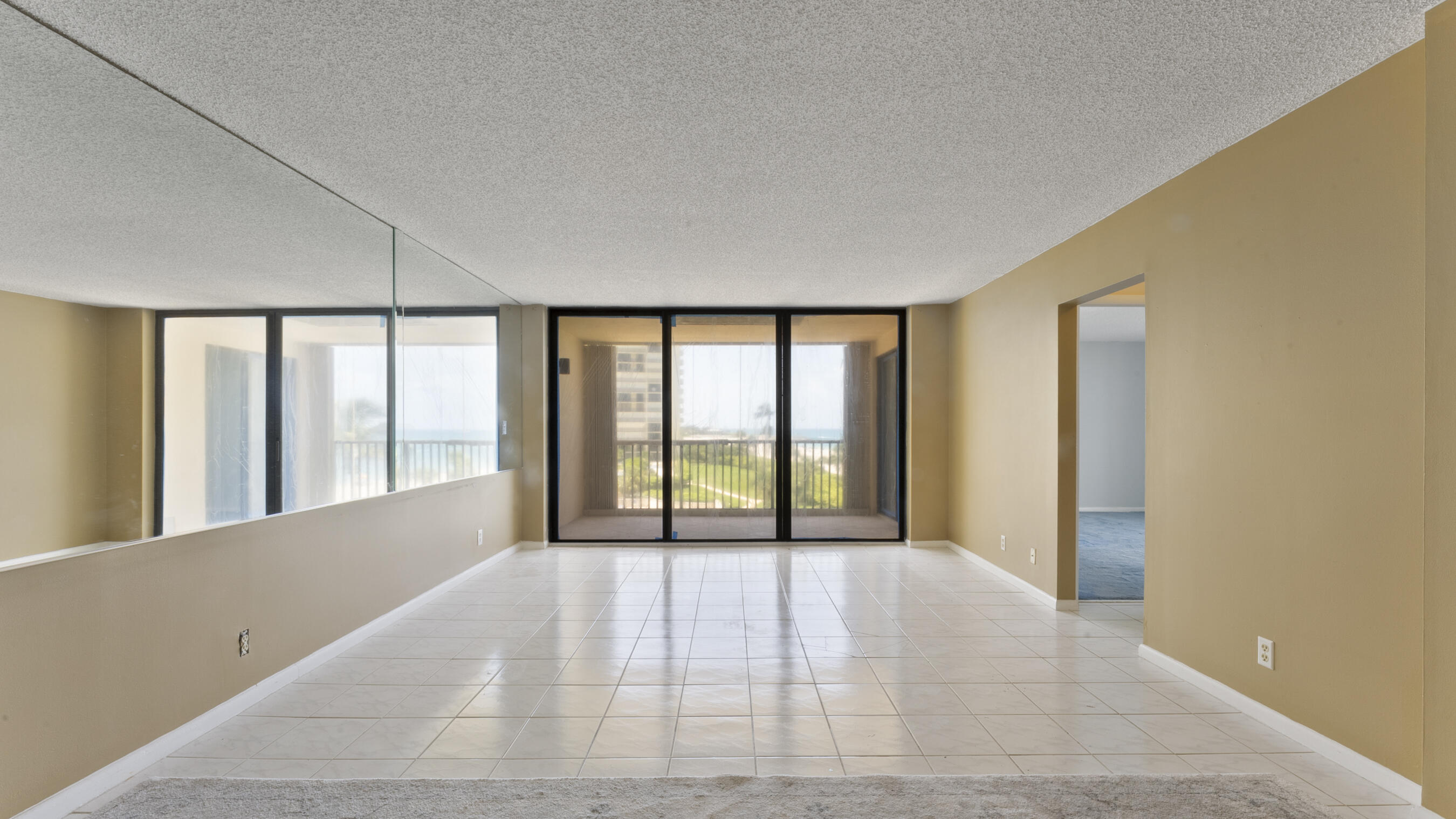 300 Ocean Trail Way, Unit 401 Jupiter, FL 33477 - Photo 5 of 41 a view of an empty room with a window