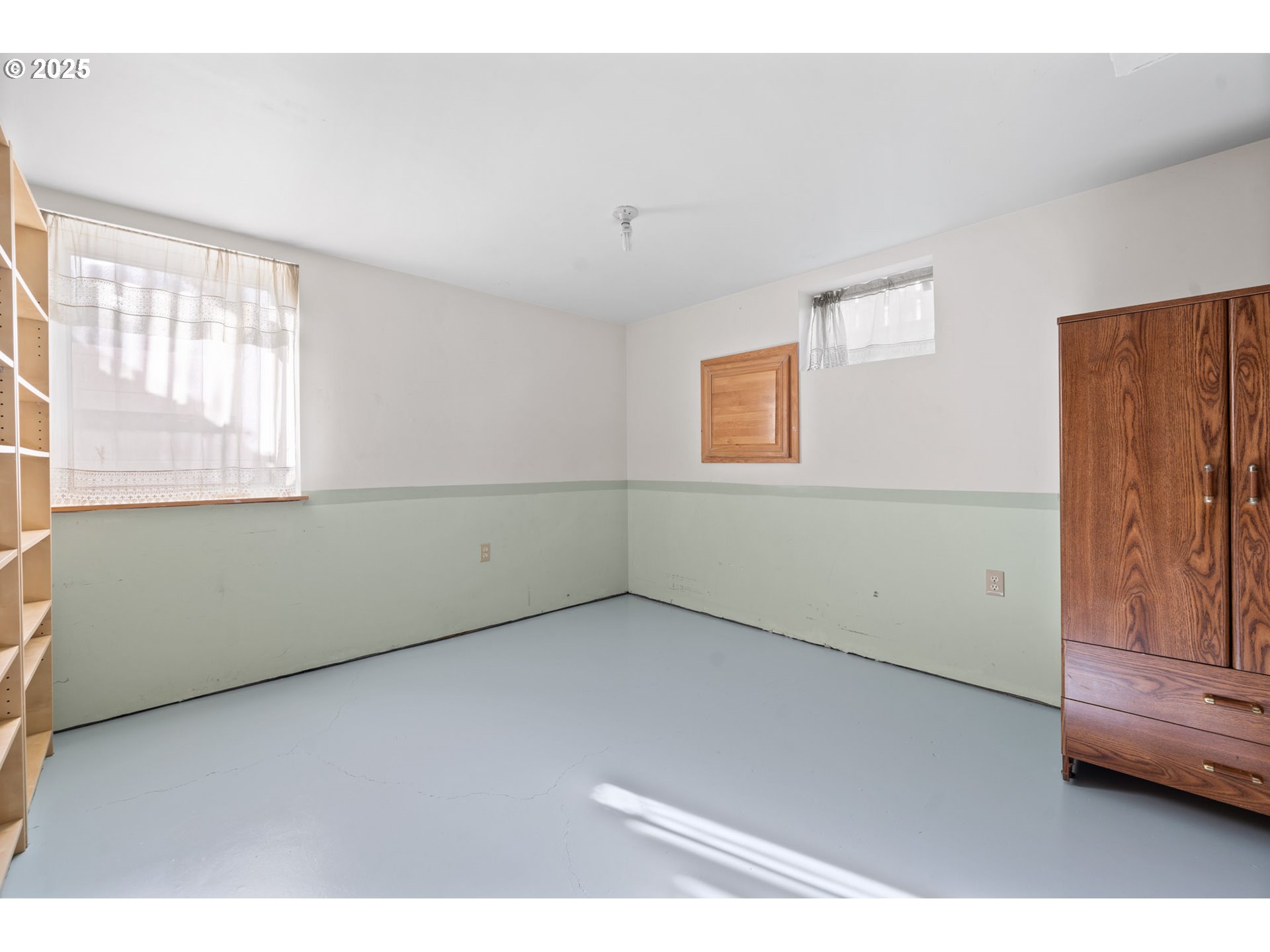12342 Northeast Knott Street Portland, OR 97230 - Photo 25 of 40 a view of an empty room with a window